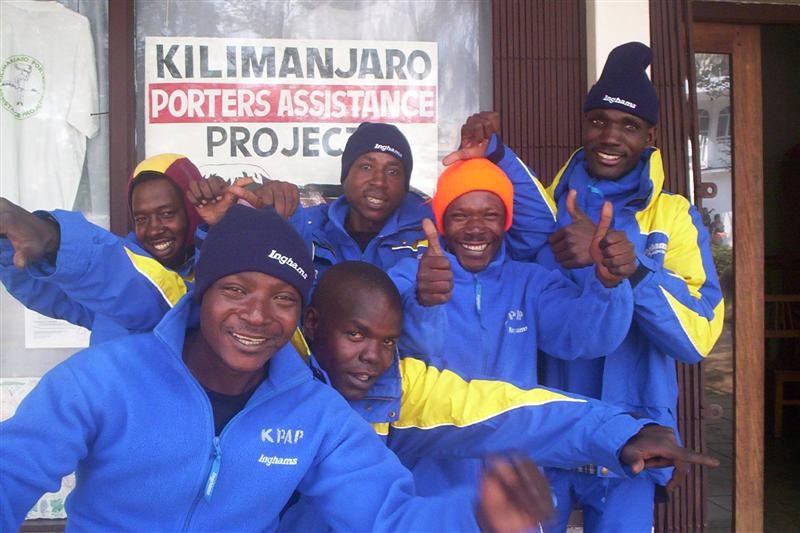 porters in front of the KPAP sign